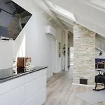 Four-bedroom In Hébergement de vacances *